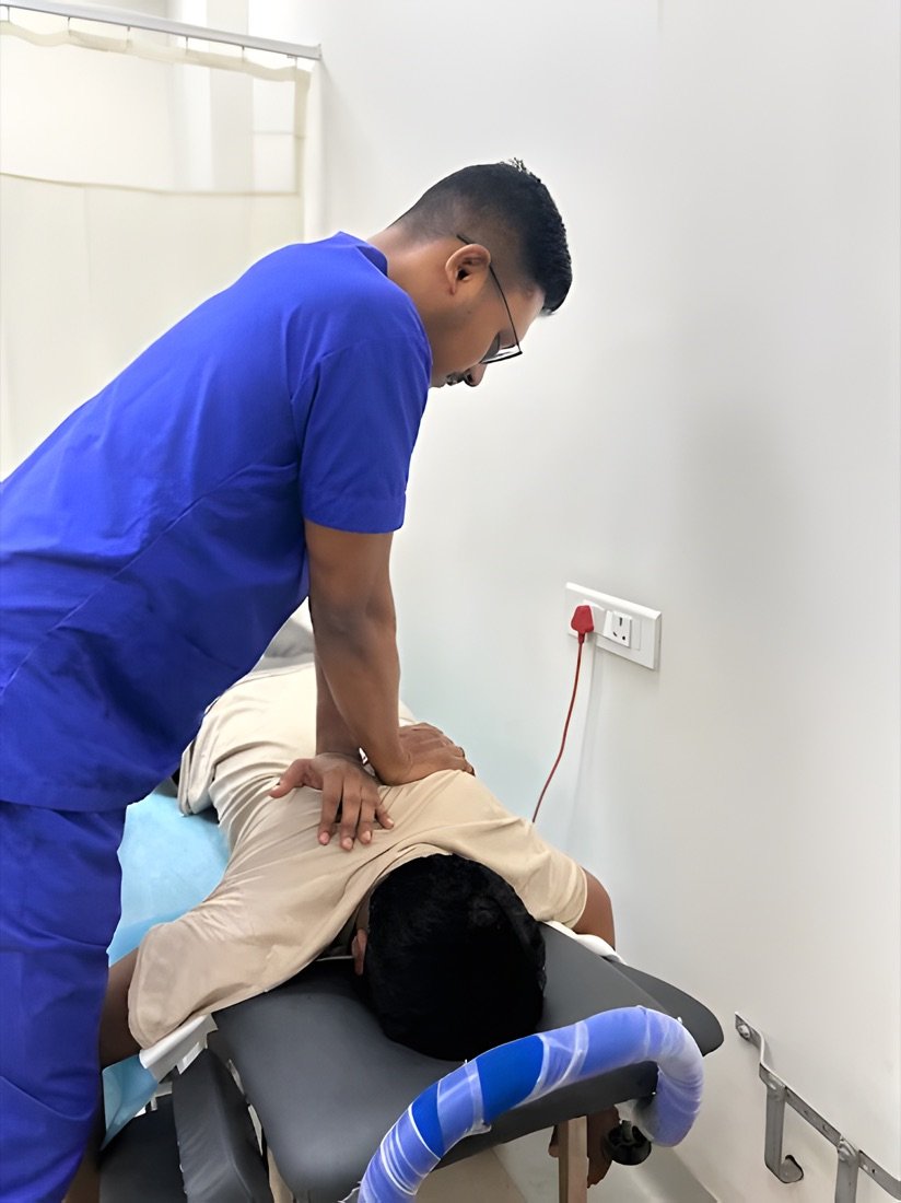 Physiotherapist giving hands-on manual therapy to a patient at Physiotrix